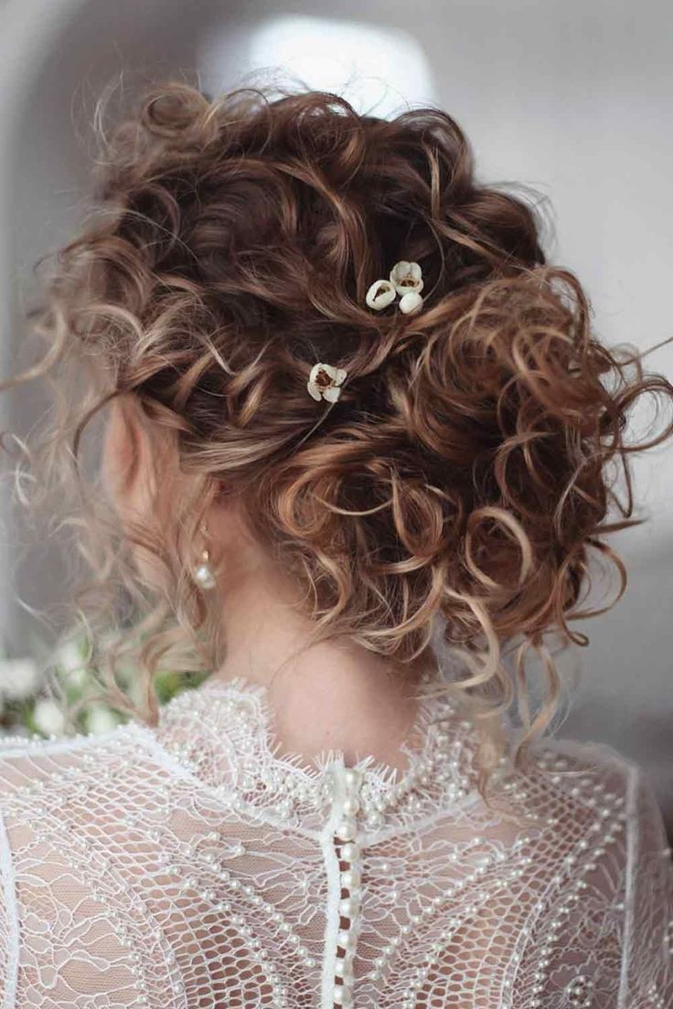 Curly Updo with Floral Accents